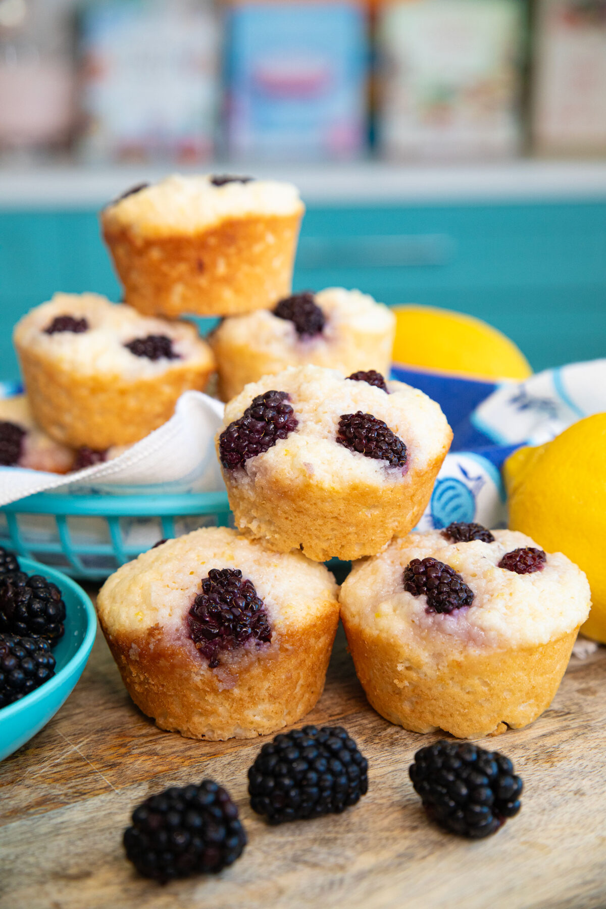 lemon blackberry muffins in a stack