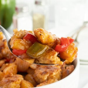 Sweet and sour chicken on spoon