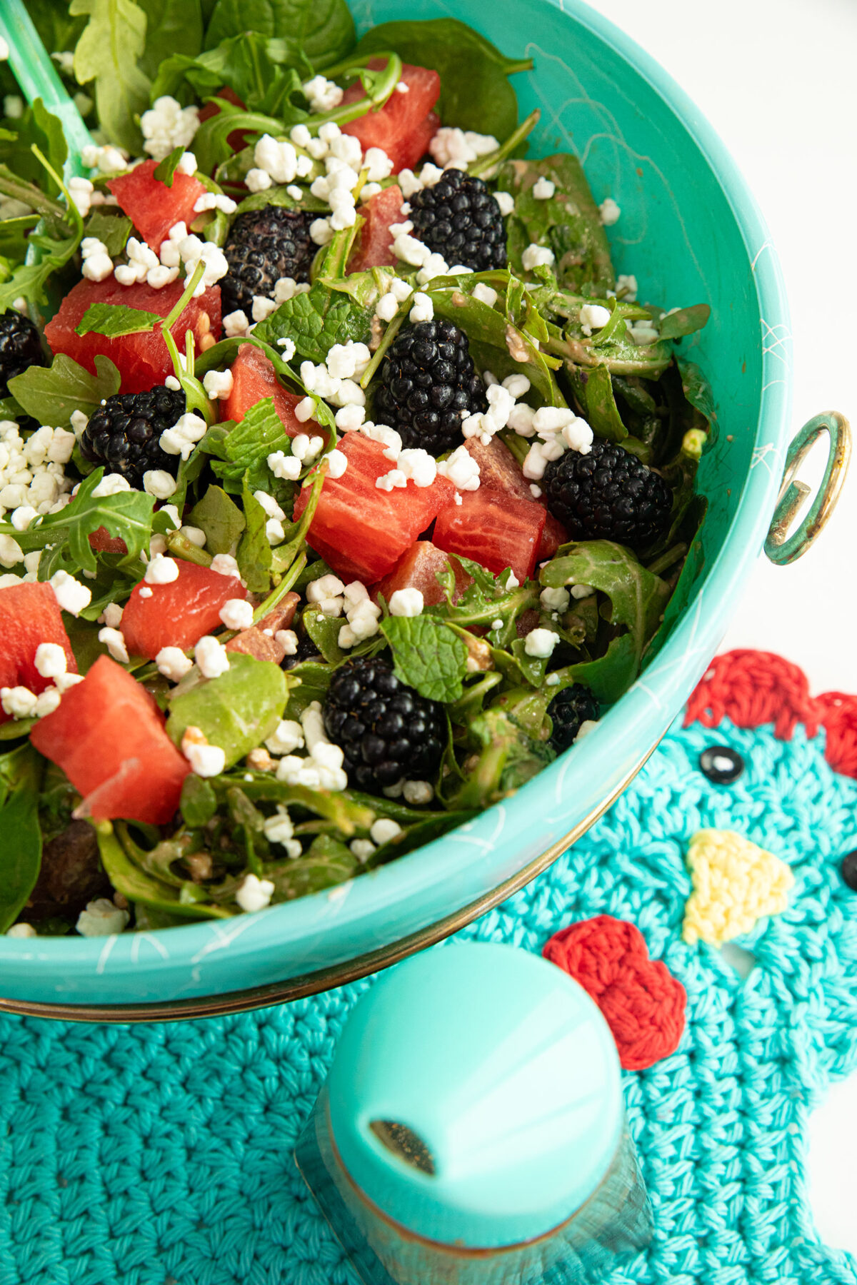 close up of the bowl full of watermelon salad with feta and mint